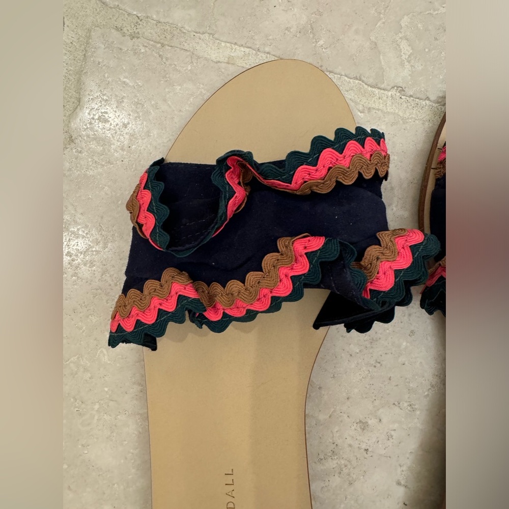 Loeffler Randall blue suede slides with hot pink, tan, and dark green trim.